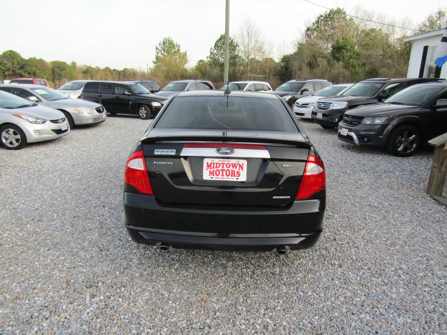 2011 Black /Tan Ford Fusion (3FAHP0JG4BR) , Automatic transmission, located at 15016 S Hwy 231, Midland City, AL, 36350, (334) 983-3001, 31.306210, -85.495277 - Photo#6